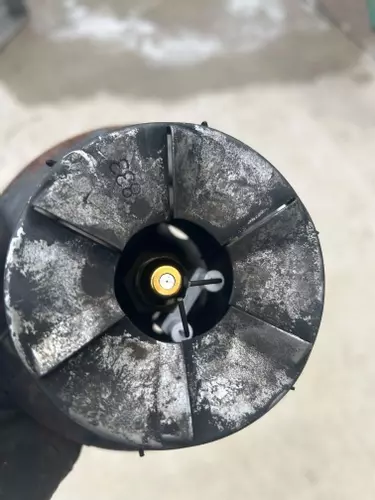 Burner head and nozzle assembly from Nilfisk Contractor diesel hot pressure washer during boiler repair.